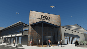 Wing drones flying out from the Orion shopping centre rooftop in Springfield Central