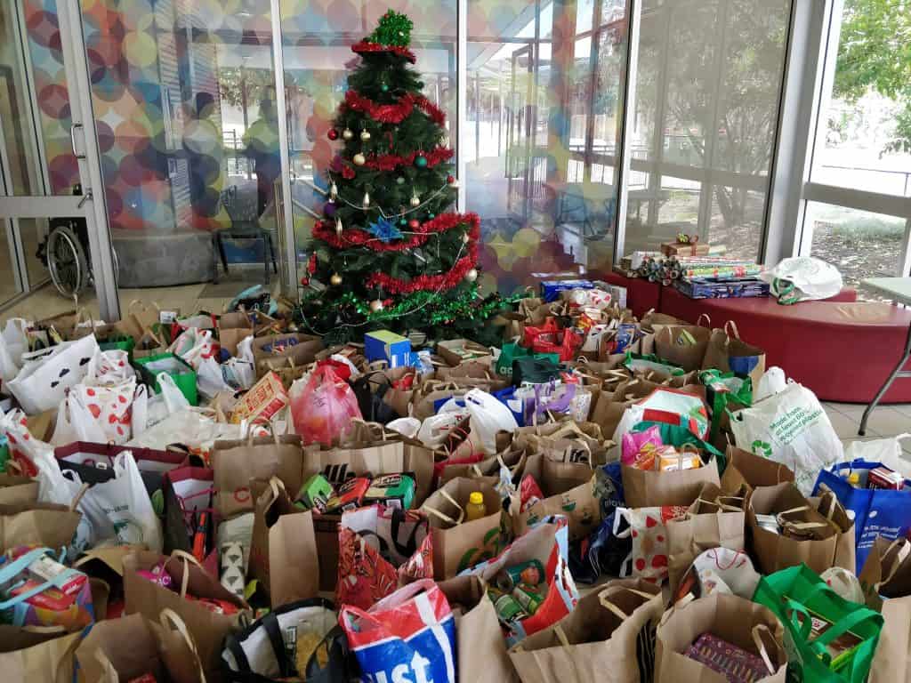 YMCA Springfield Lakes was full of Christmas spirit last month as staff and volunteers organised thousands of gifts for needy families.
