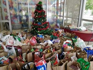 YMCA Springfield Lakes was full of Christmas spirit last month as staff and volunteers organised thousands of gifts for needy families.